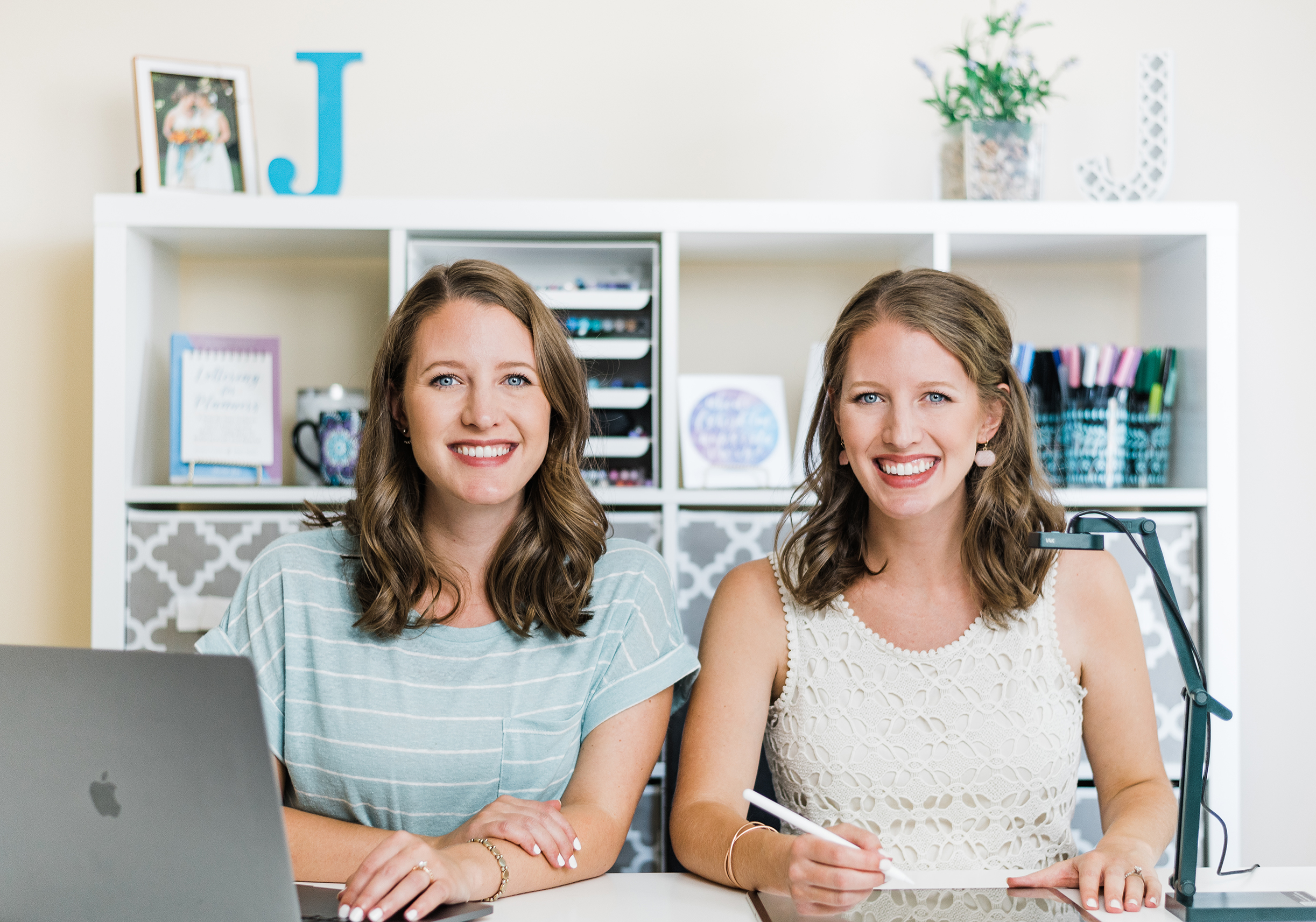 Jillian and Jordan smiling using free calligraphy guide sheets 
